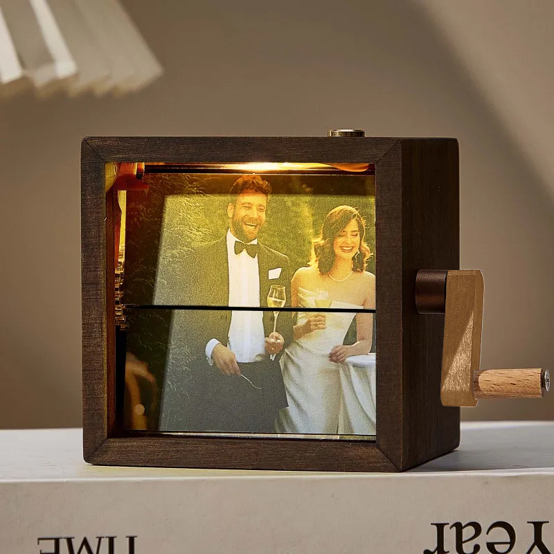 Hand-cranked custom photo flipbook frame, wooden anniversary gift with light.