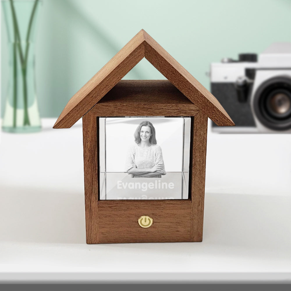 Custom wooden house night light with 3D crystal photo engraving of a woman. Warm lighting, perfect personalized gift.